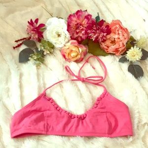 Cute pink swimsuit top.